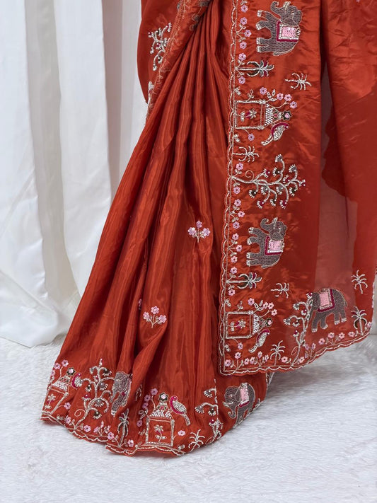 Rust Orange Embroidered Festive Saree with Traditional Border