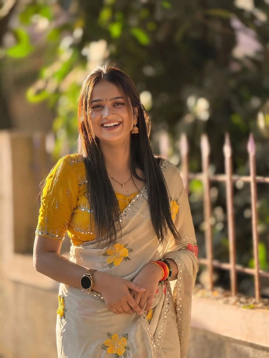 elegant and simple flower border saree