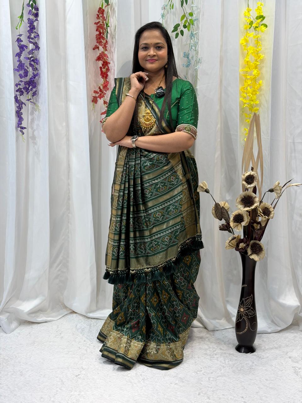 Regal Green Silk Saree with Intricate Weaving