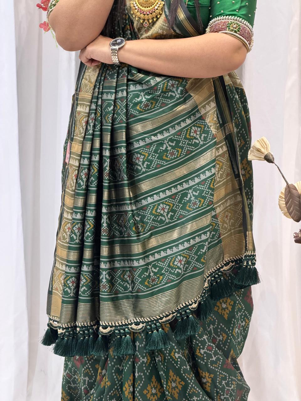 Regal Green Silk Saree with Intricate Weaving