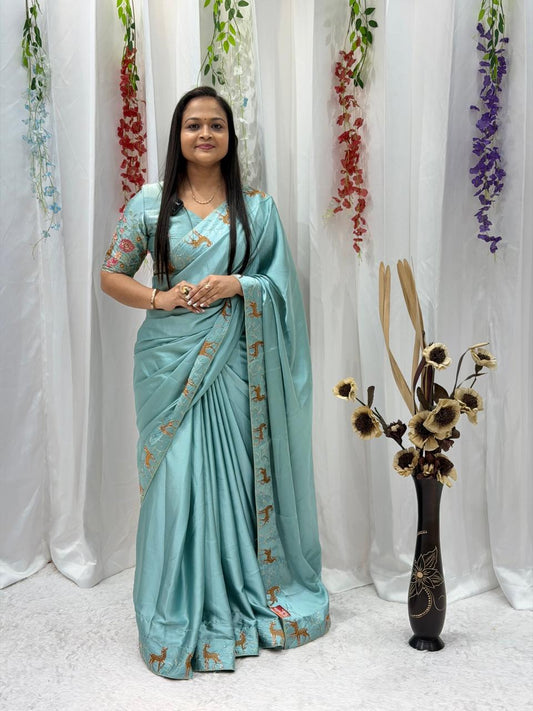 Festive Wear Aqua Blue Saree with Unique Animal Pattern Border