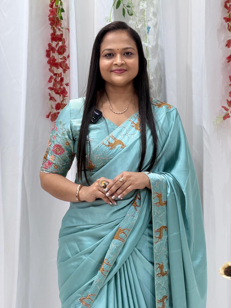 Festive Wear Aqua Blue Saree with Unique Animal Pattern Border