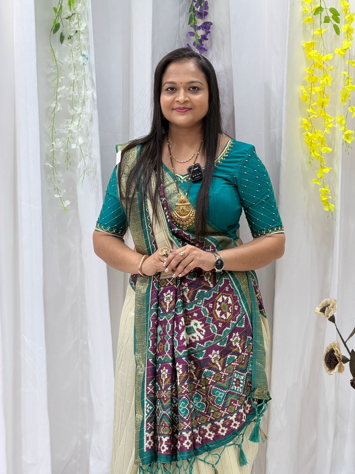 Elegant Cream & Teal Patola Print Saree with Rich Pallu & Tassel Detailing