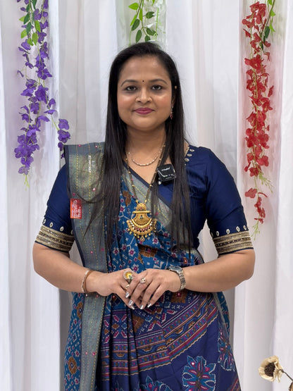 Timeless Blue Saree with Multicolor Traditional Motifs