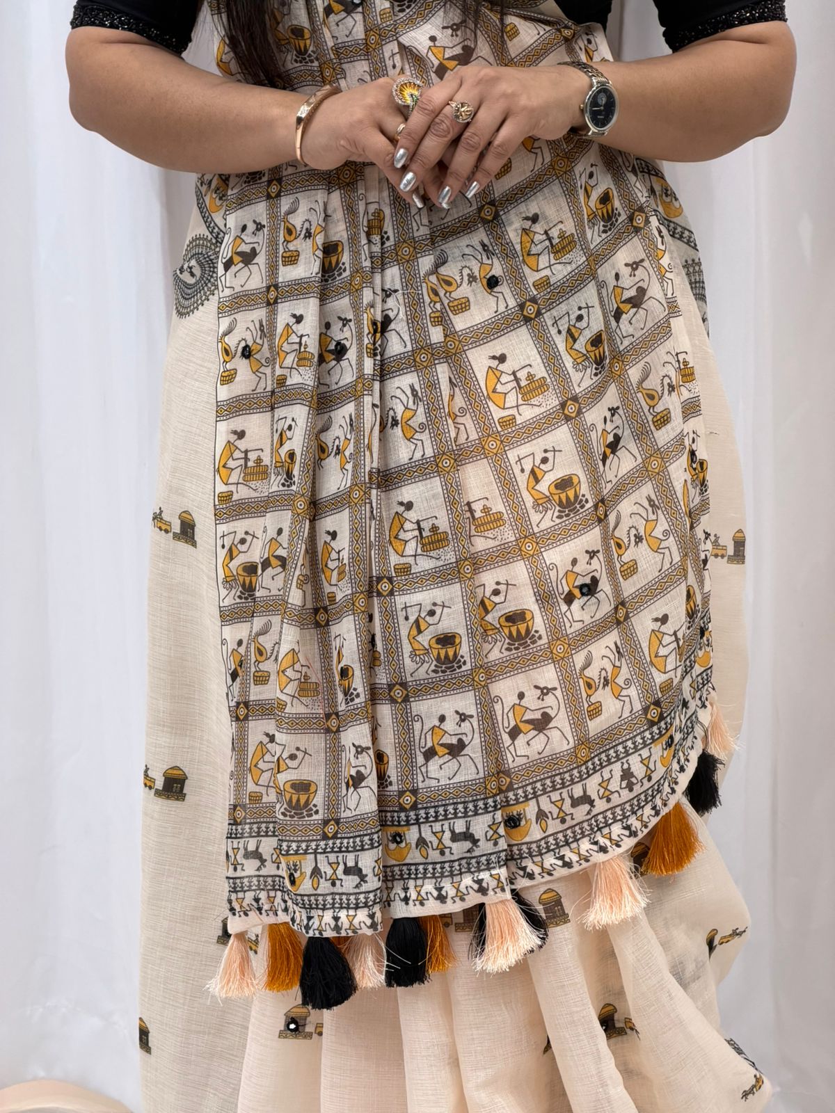 Artistic Beige Saree with Folk Print & Tassel Pallu
