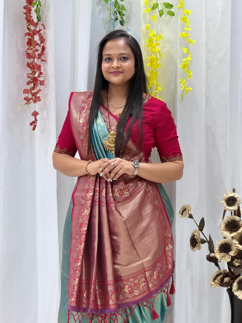 Elegant Teal & Rani Pink Banarasi Silk Saree with Rich Zari Weaving & Tassel Pallu