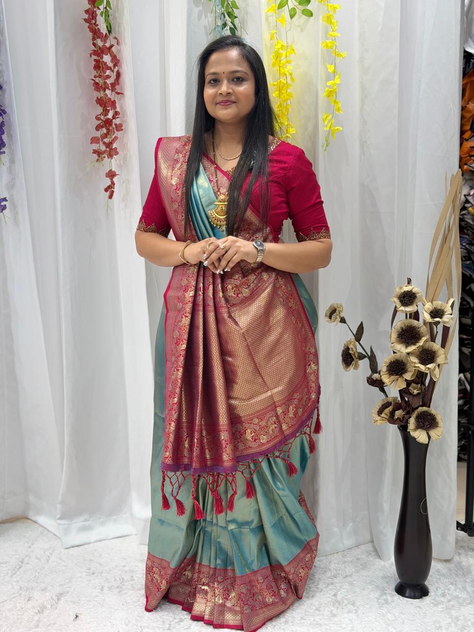 Elegant Teal & Rani Pink Banarasi Silk Saree with Rich Zari Weaving & Tassel Pallu