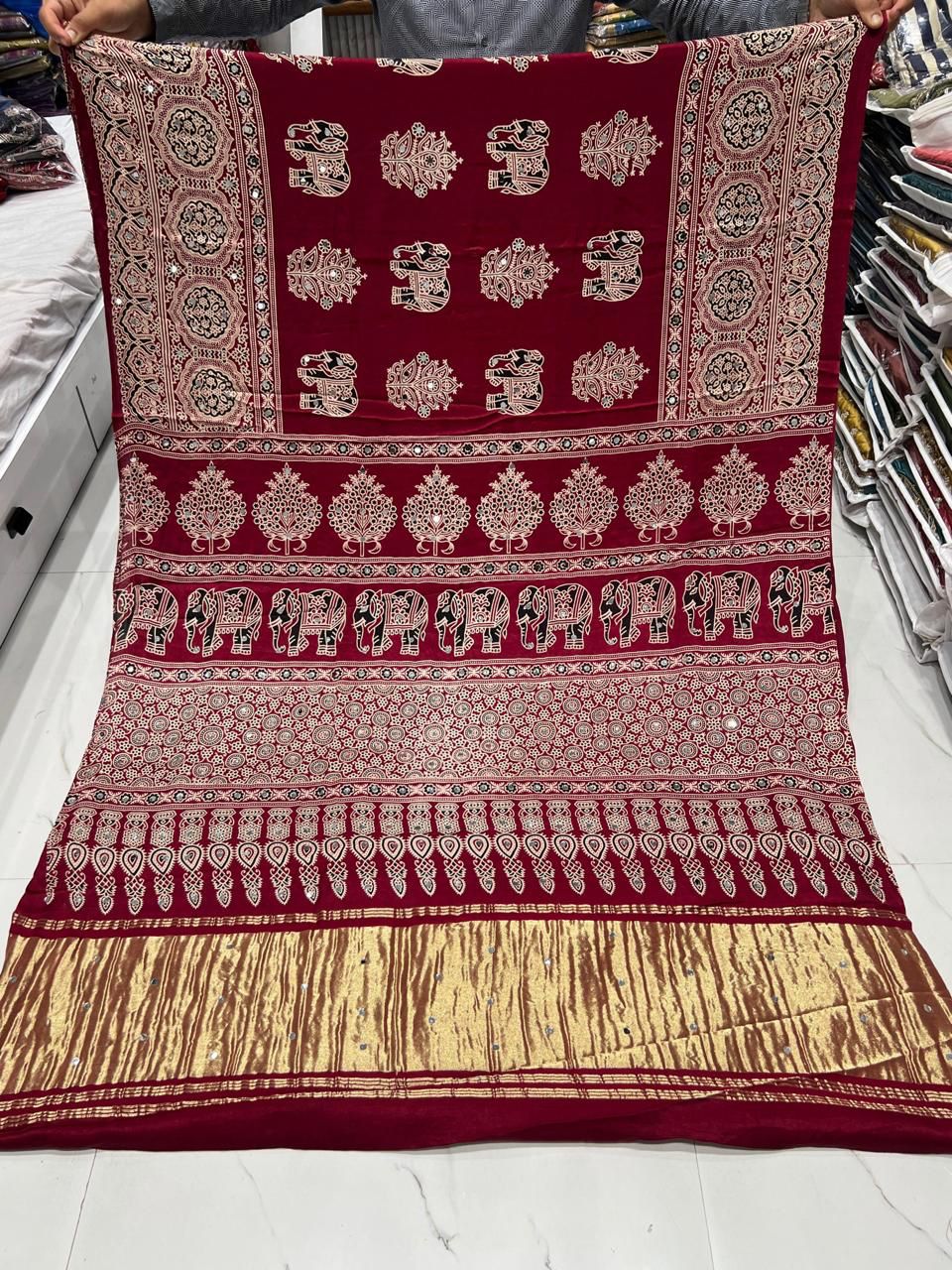 Traditional Maroon Festival Wear Saree with Artistic Motifs
