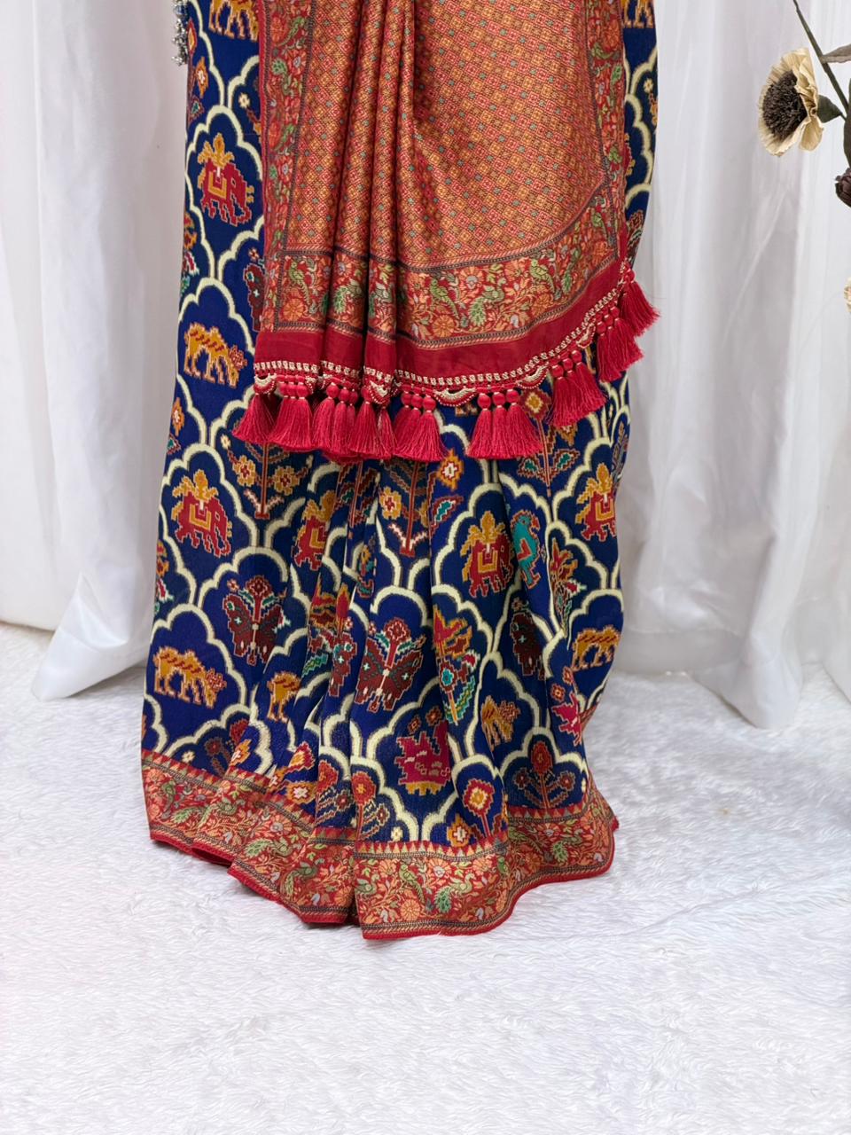 Royal Blue & Red Traditional Printed Saree with Elegant Tassel Border