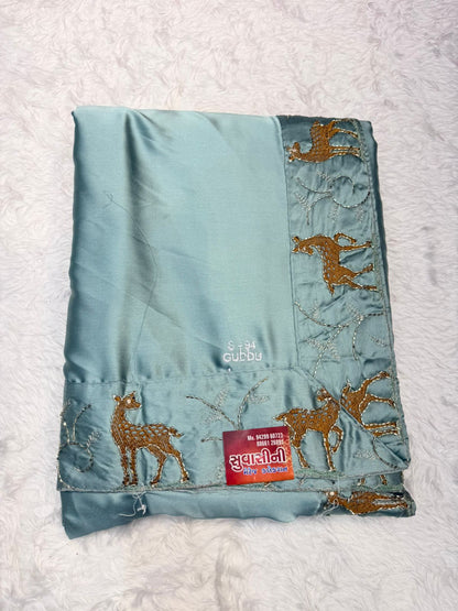 Festive Wear Aqua Blue Saree with Unique Animal Pattern Border