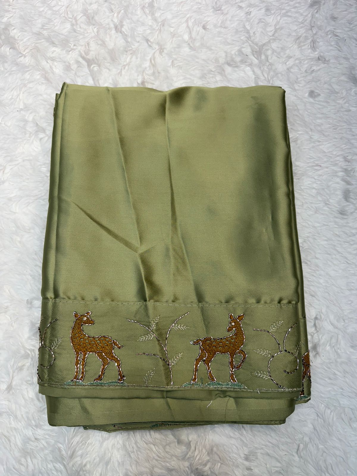 Festive Wear Aqua Blue Saree with Unique Animal Pattern Border