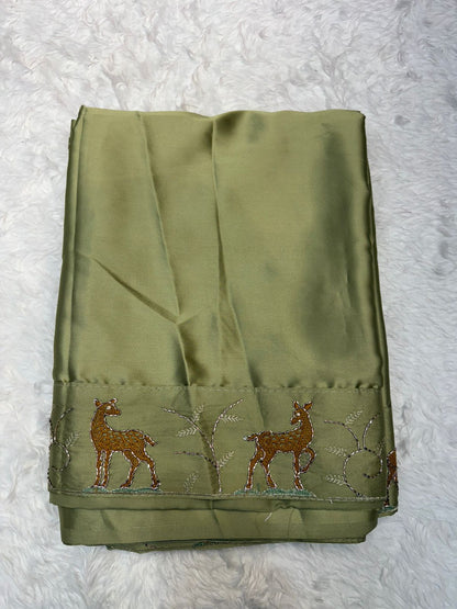 Festive Wear Aqua Blue Saree with Unique Animal Pattern Border