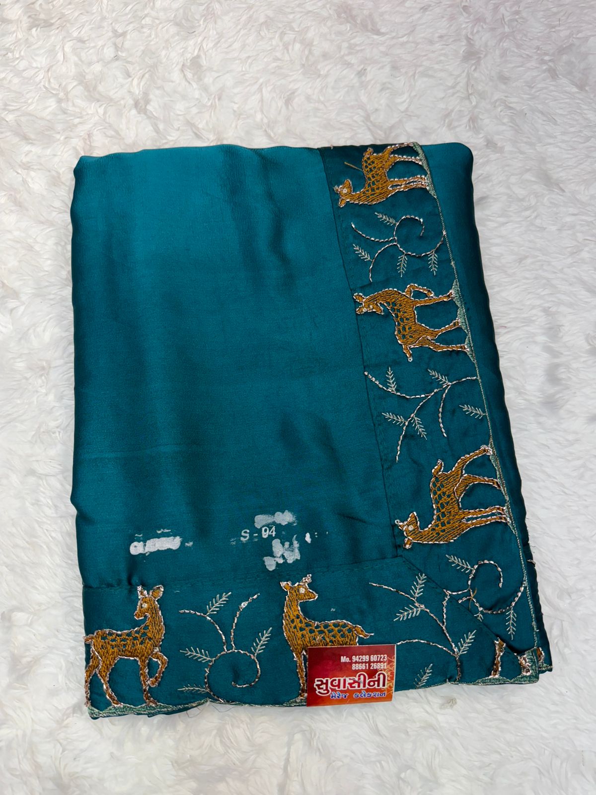 Festive Wear Aqua Blue Saree with Unique Animal Pattern Border