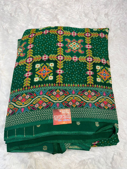 Festive Teal Green Saree with Intricate Traditional Patterns