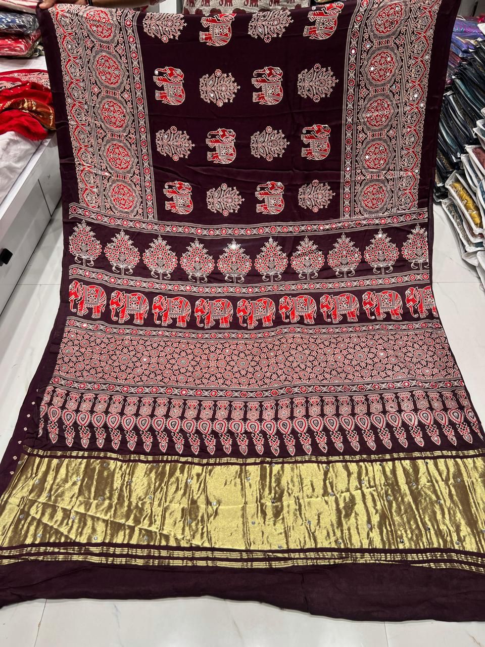 Traditional Maroon Festival Wear Saree with Artistic Motifs
